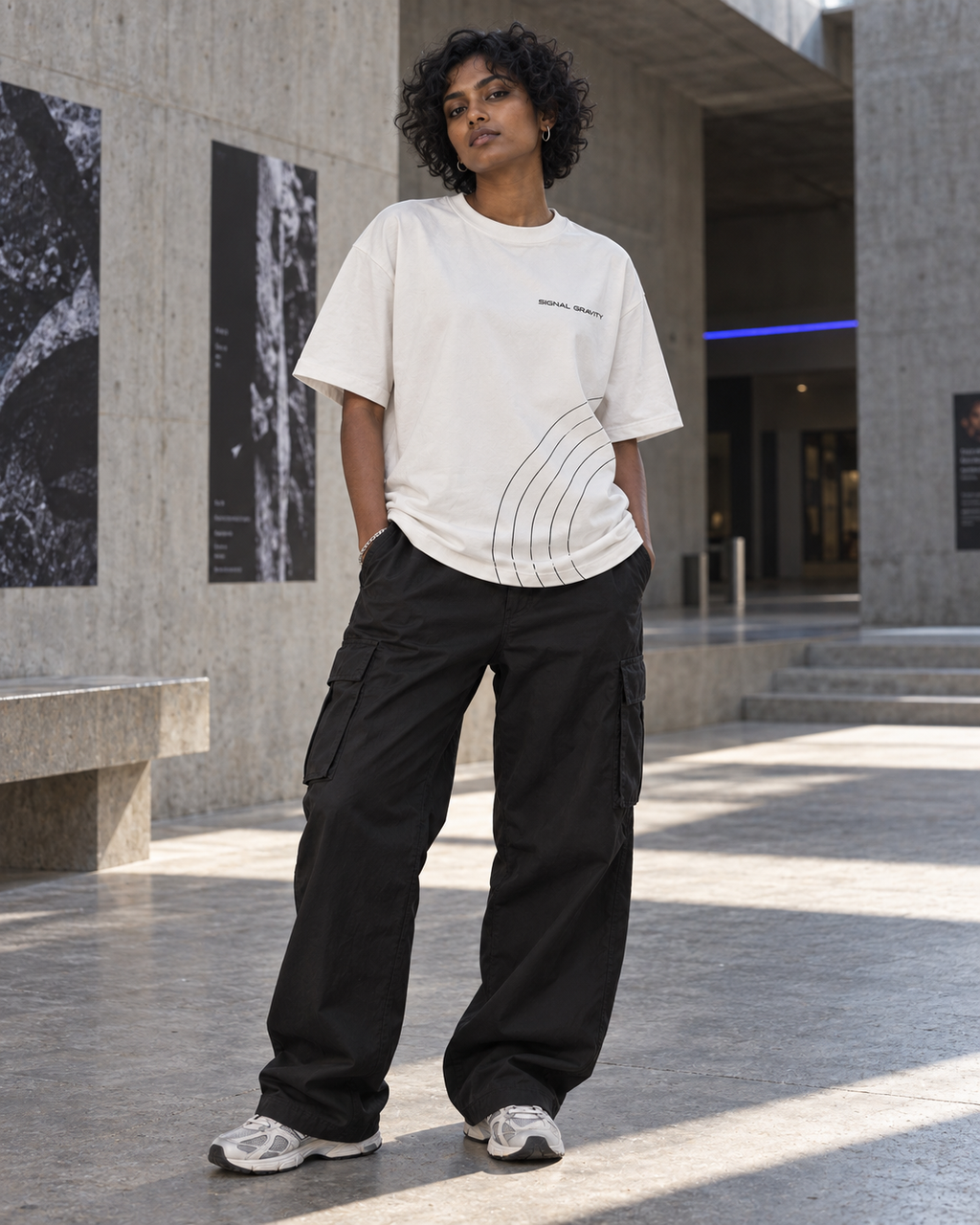 Female model wearing Signal Gravity Hero Tee - Off White
